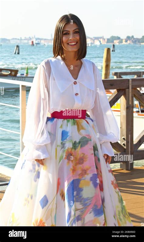 Alessandra Mastronardi photoshoot on the Lido Beach in Venice,。